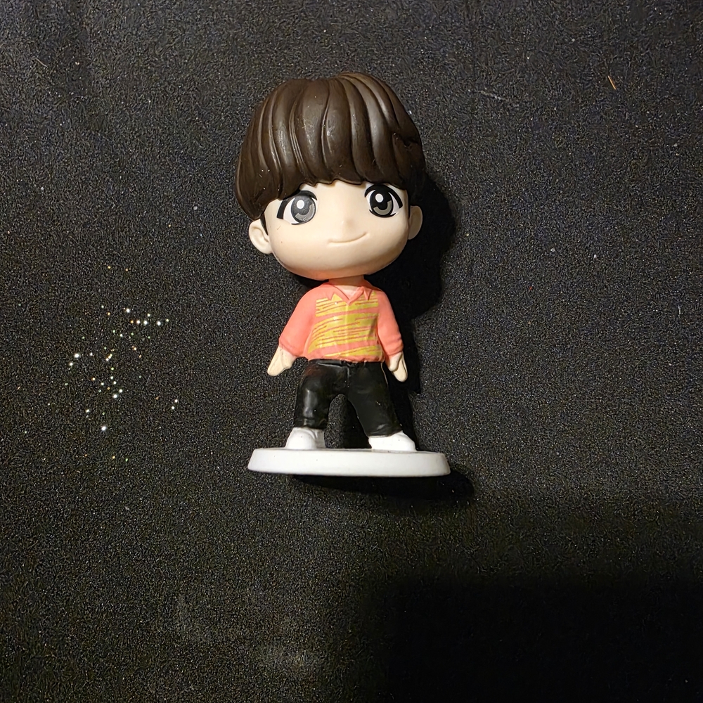 Adorable Brown-Haired Toy Figure